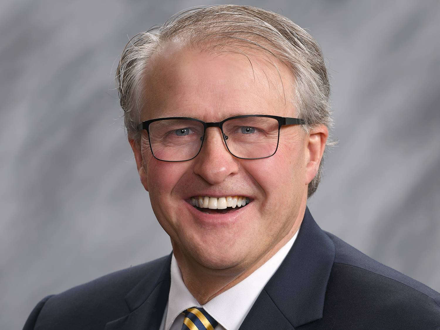 Headshot of David Crum