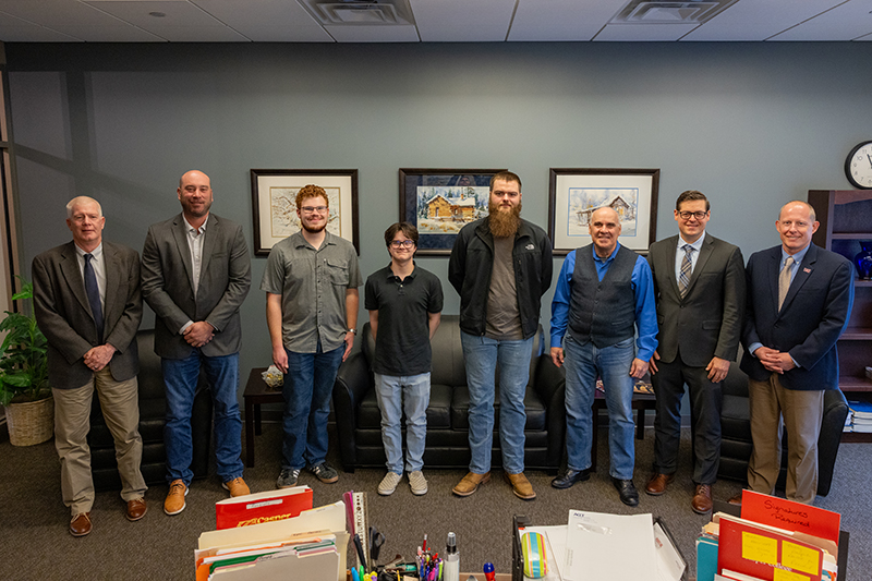 Mines’ partnership with Casper College offers students a pathway to bachelor’s degrees in metallurgical, civil and industrial engineering. Pictured left to right: Jerry Hawks, Ph.D., vice president academic affairs for Casper College; Jeff Sun, dean, Casper College School of Science; Casper College students Ethan Green, mechanical engineering, Samson Peterson, metallurgical engineering and Nolan Goulart, metallurgical engineering; Paul Marquard, Ph.D., Casper College engineering instructor; Brian Tande, Ph.D., South Dakota Mines president; Brandon Kosine, Ph.D., Casper College president.
