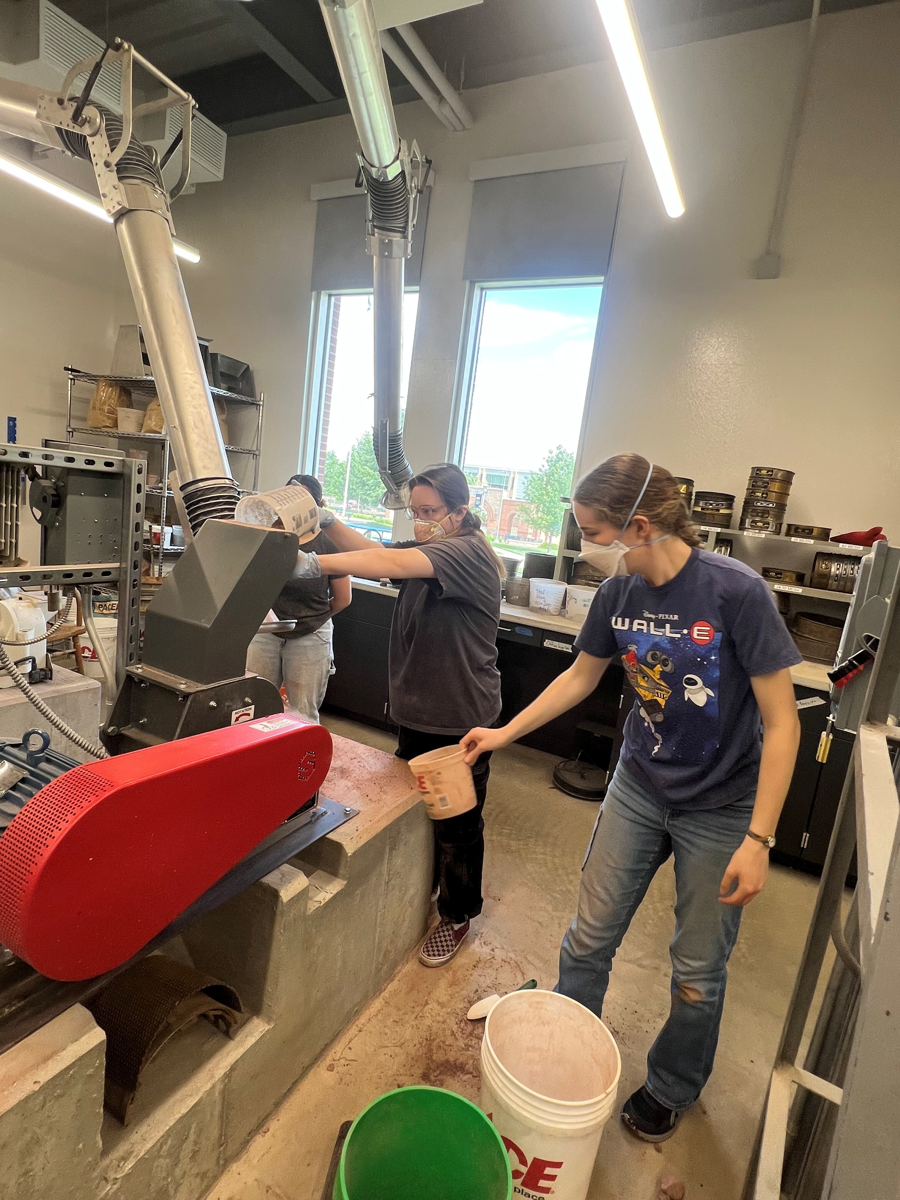 South Dakota Mines students help process the clay that will be sent to artists for an upcoming South Dakota Mines Exhibition. 