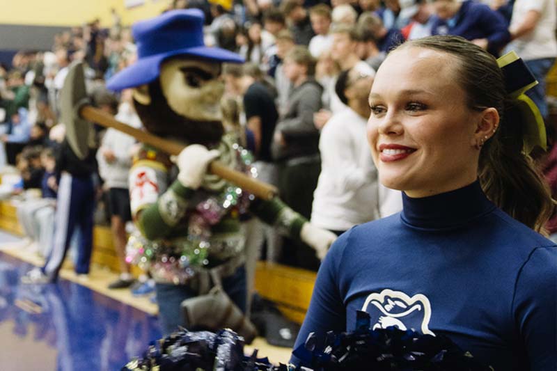 Cheerleader at basketball game