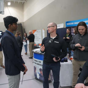 Student Talking With Employer